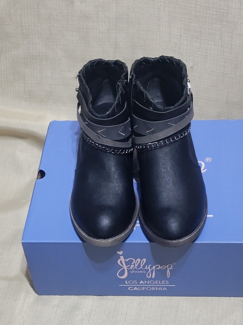 Jellypop Black Ankle Booties with Chain and Strap Accents